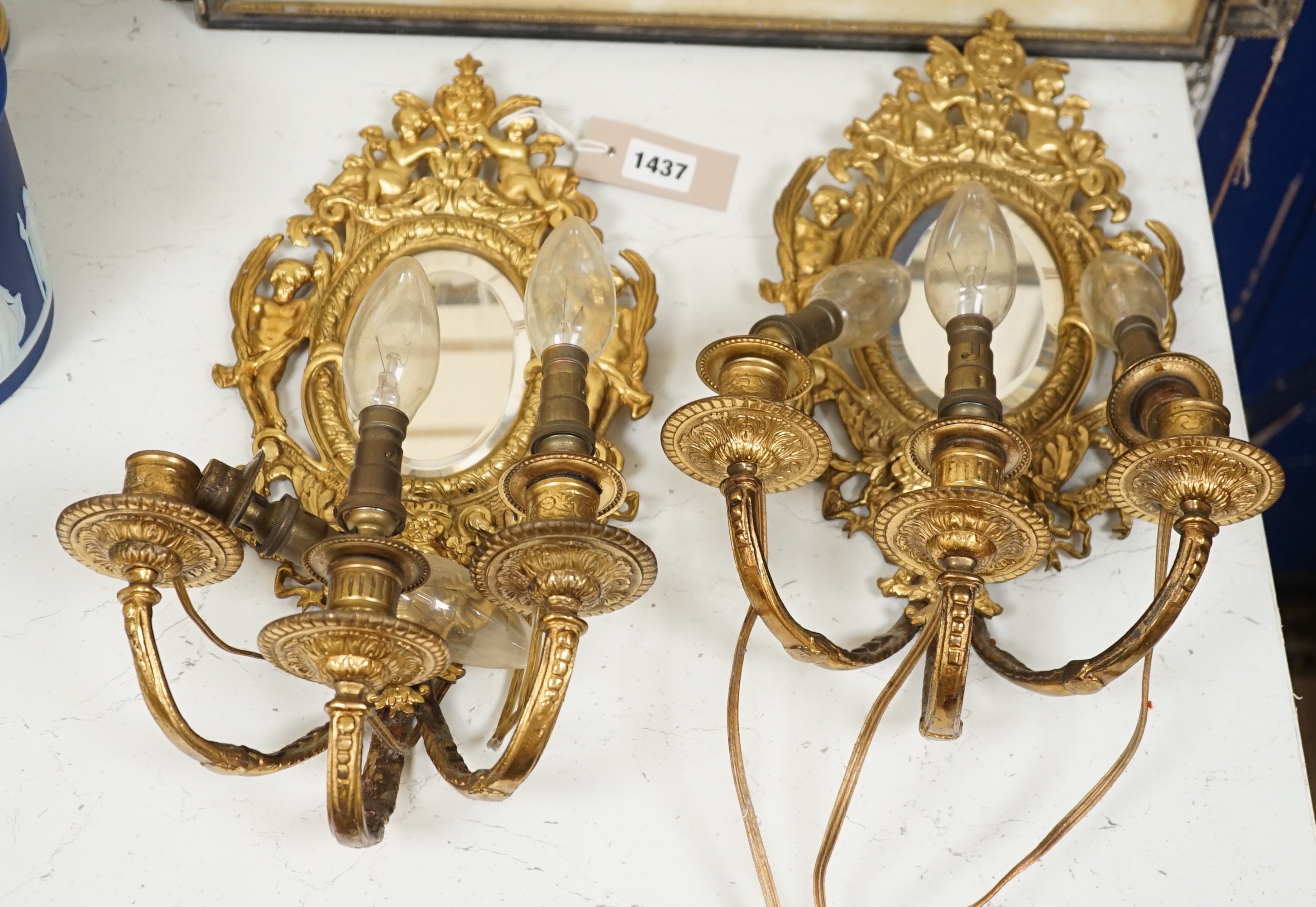 A pair of ormolu three branch girandole mirrors, c.1900, Converted to electricity, 40 cm high
